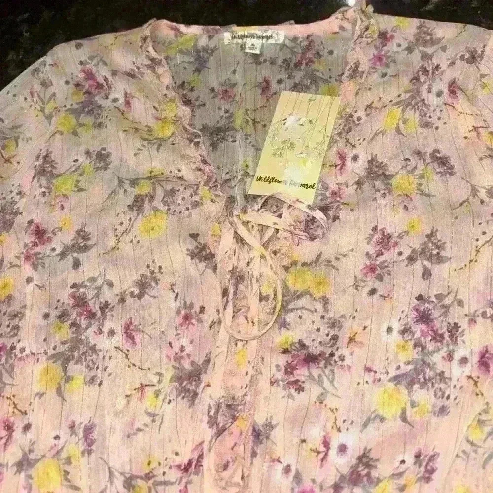 Wildflower apparel, bohemian blouse. NWT. Flowered, 100% polyester, V neck w/tie
